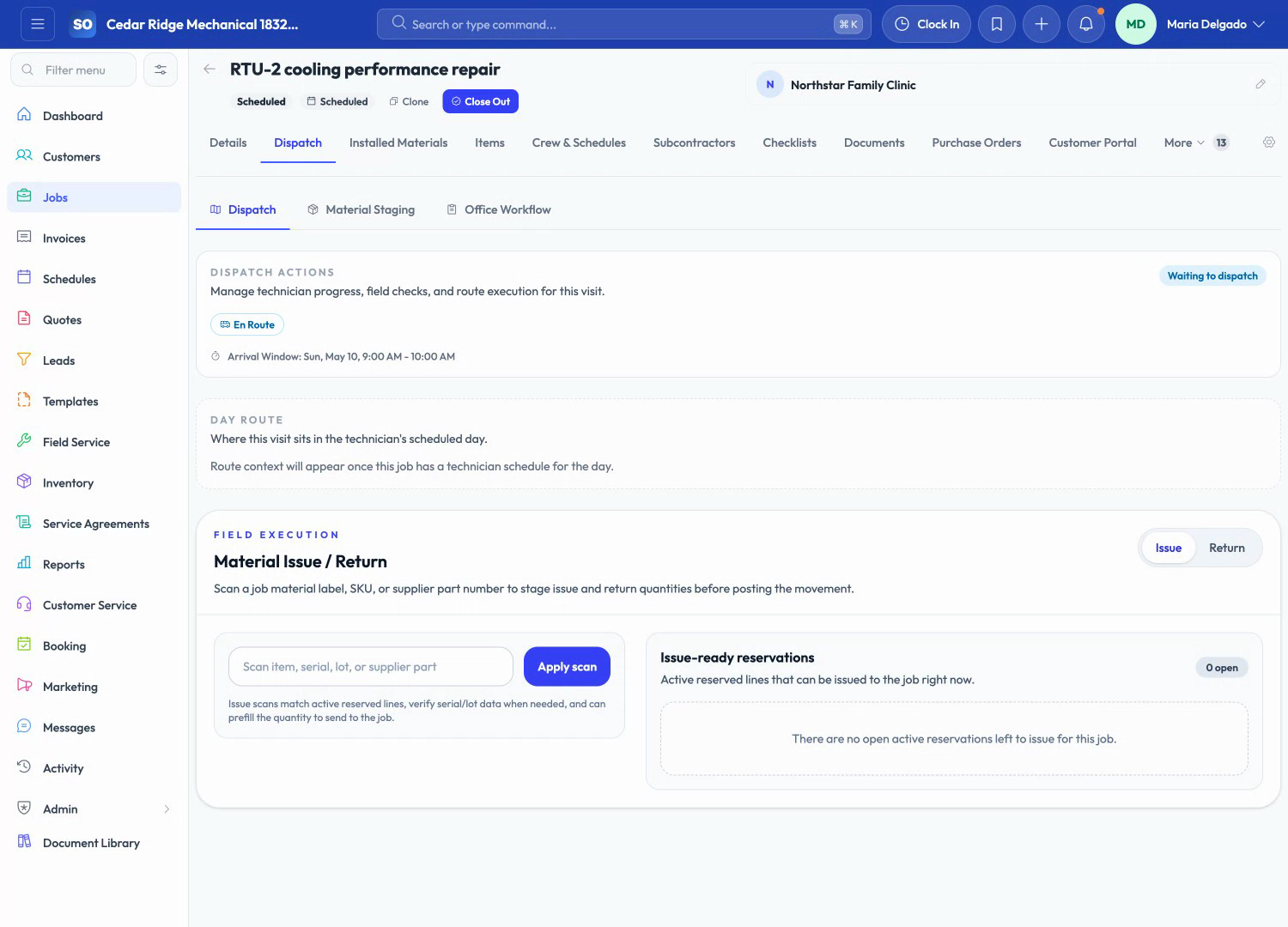 ServiceOpus job workspace with overview, assignments, material needs, and closeout actions